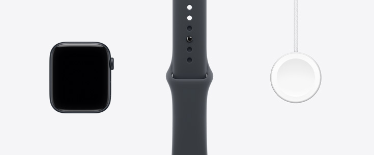 Apple Watch SE 3, Aluminiumgehäuse, Farbe Mitternacht, Vorderseite, All‑Screen Display, Sportarmband in Mitternacht, Apple Watch Magnetisches Schnellladegerät auf USB‑C Kabel
