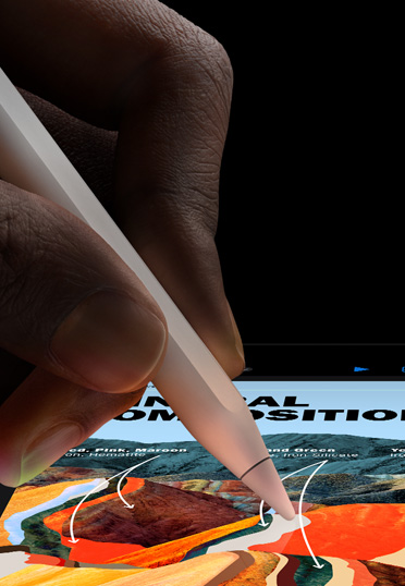 A close up shot of an Apple Pencil in hand, drawing on iPad screen.