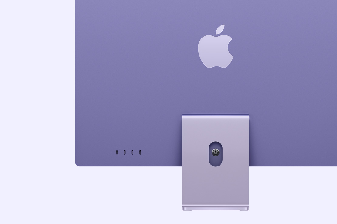 Imagem da parte de trás de um iMac roxo, com destaque para as quatro portas USB-C