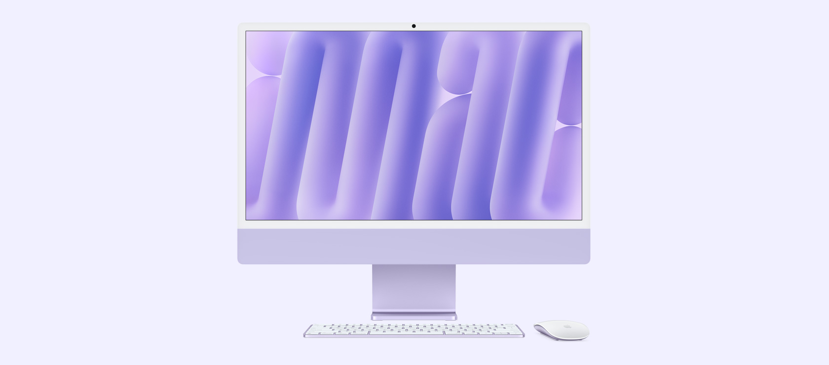 Imagem da frente de um iMac roxo com mouse e keyboard na mesma cor